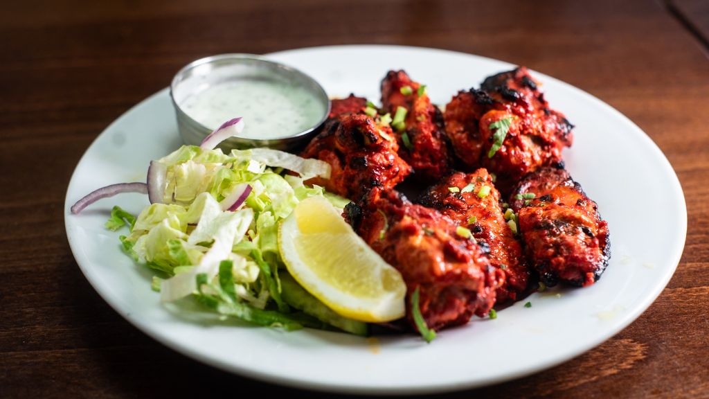 Tandoori kebab platter with salad and raita